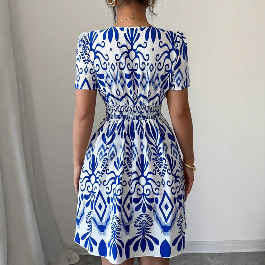 Damen Sommerliches Mini-Kleid mit elegantem V-Ausschnitt und floralen Mustern EB