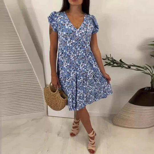 Damen Sommerliches Blütenmuster Kleid mit V-Ausschnitt und Rüschendetails Heidi-Mode