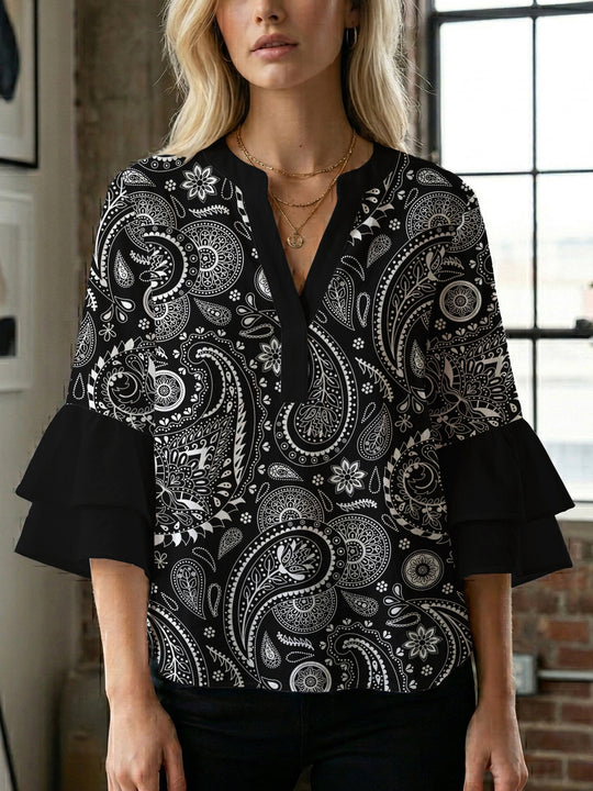 Damen Bluse mit voluminösen Flügelärmel und intensivem Blattmuster EB
