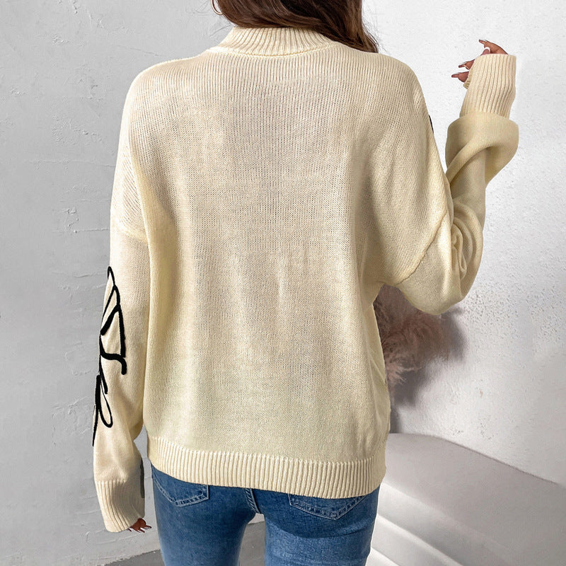 Damen Strickpullover mit floralem Design und hohem Kragen EB