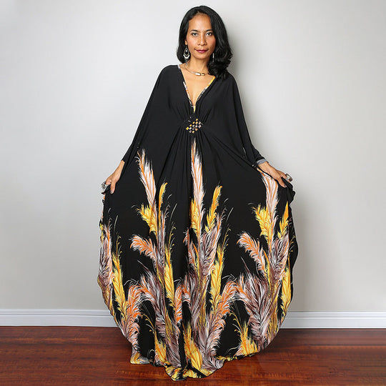 Damen Maxikleid mit kunstvollem Pfauenmuster und seitlichen Schlitzen Heidi Mode