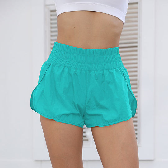 Damen Sportliche Laufshorts mit elastischem Bund und seitlichen Taschen EB