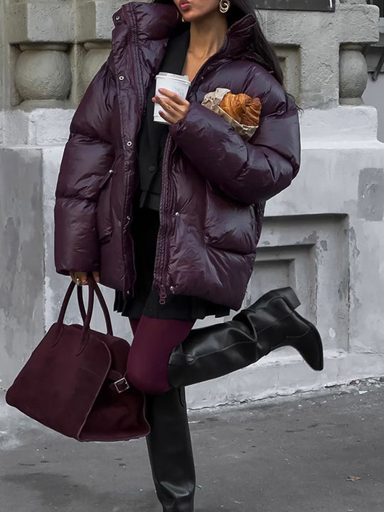 Damen Oversized Daunenjacke mit sichtbarem Steppdesign und hohem Kragen EB