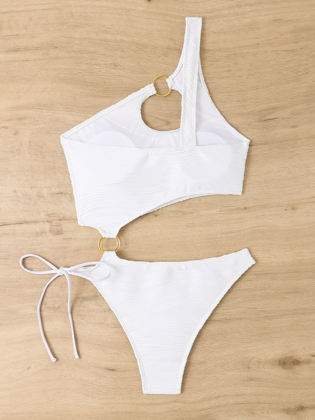 Damen Einteiler Badeanzug mit asymmetrischem Cut-Out und goldenen Akzenten EB