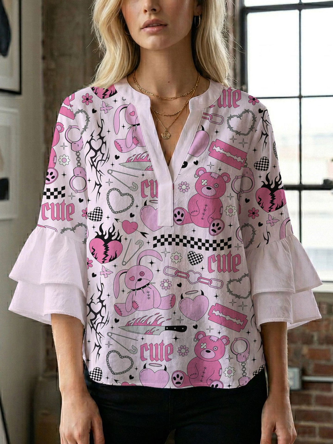 Damen Blusenshirt mit voluminösen Ärmeln und kreativem Druckdesign EB