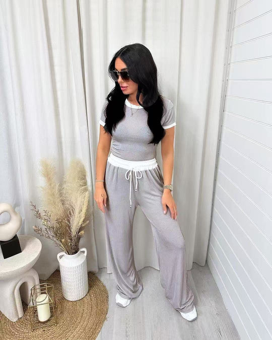 Damen lässiges zwei-teiliges Freizeit-Set mit cropped T-Shirt und weiten Hose EB