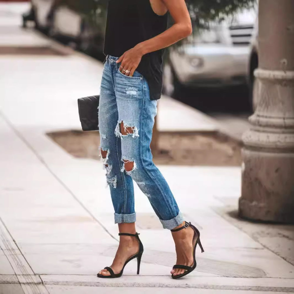 Damen Ripped Boyfriend Jeans mit lässigem Schnitt und fransigen Elementen EB