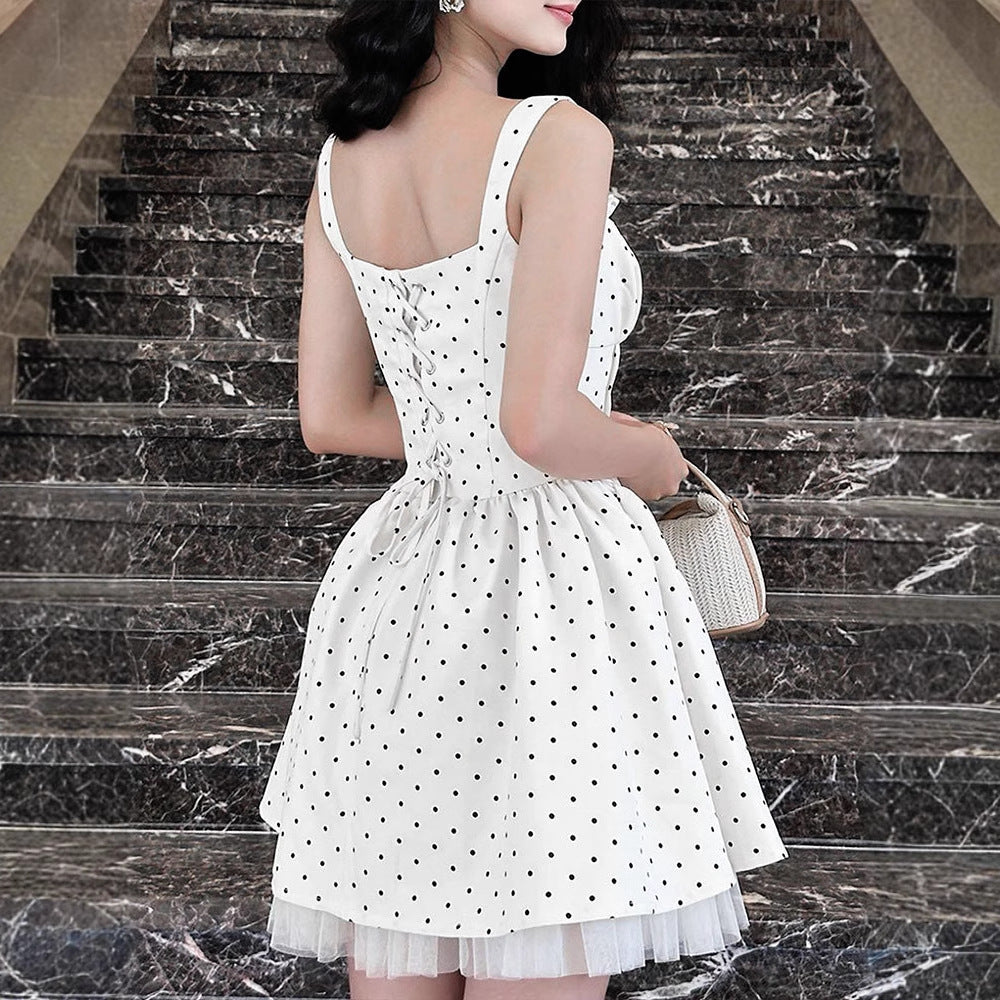 Damen Sommerliches Kleid mit schwingendem Rock und Punktmuster EB