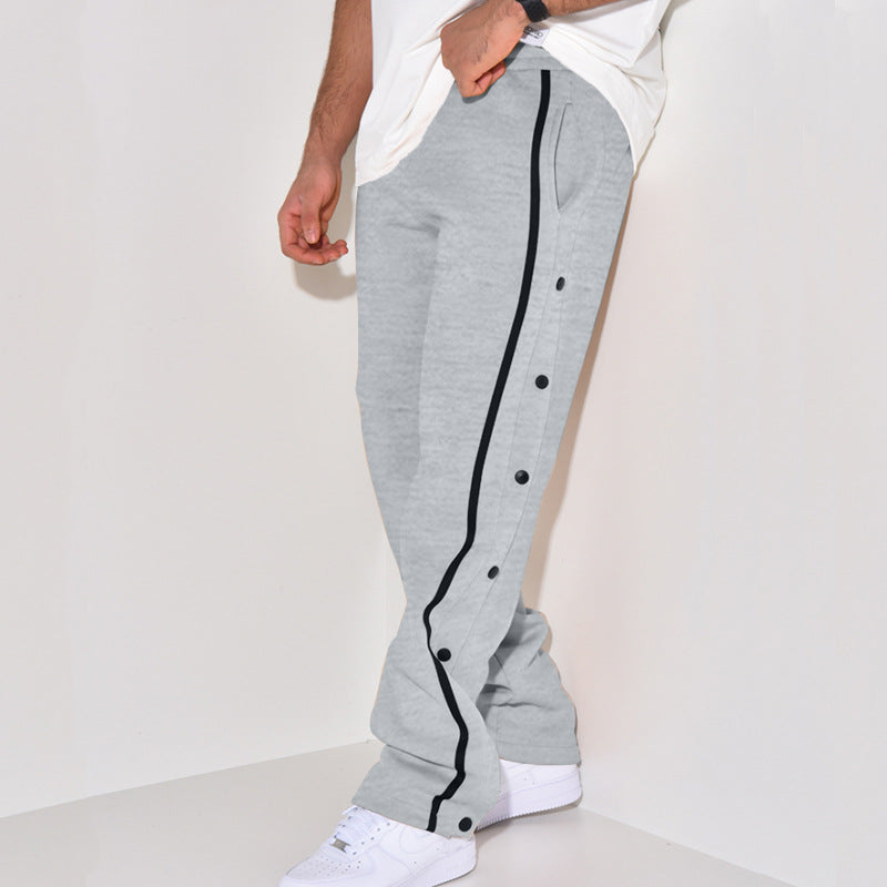 Herren Sportliche Jogginghose mit Druckknopf-Detail und seitlichen Taschen EB