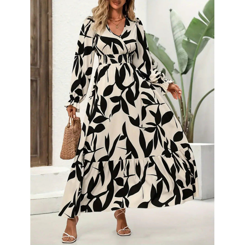 Damen Maxikleid mit floralem Muster und voluminösem Saum EB
