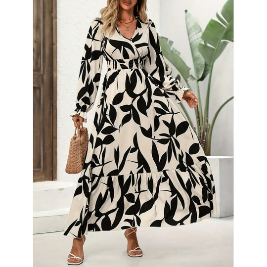 Damen Maxikleid mit floralem Muster und voluminösem Saum EB