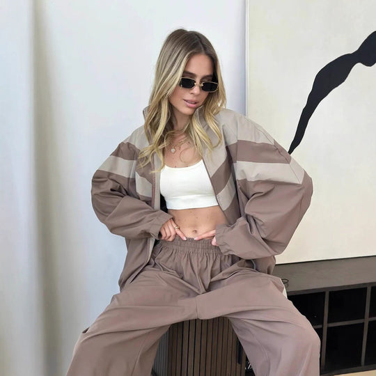 Damen Oversized Windbreaker-Set mit Reißverschlussjacke und elastischer Bundhose Eichborn Berlin