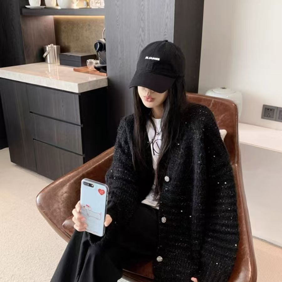 Damen Strickjacke mit voluminösen Ärmeln und einzigartiger Maschenstruktur EB