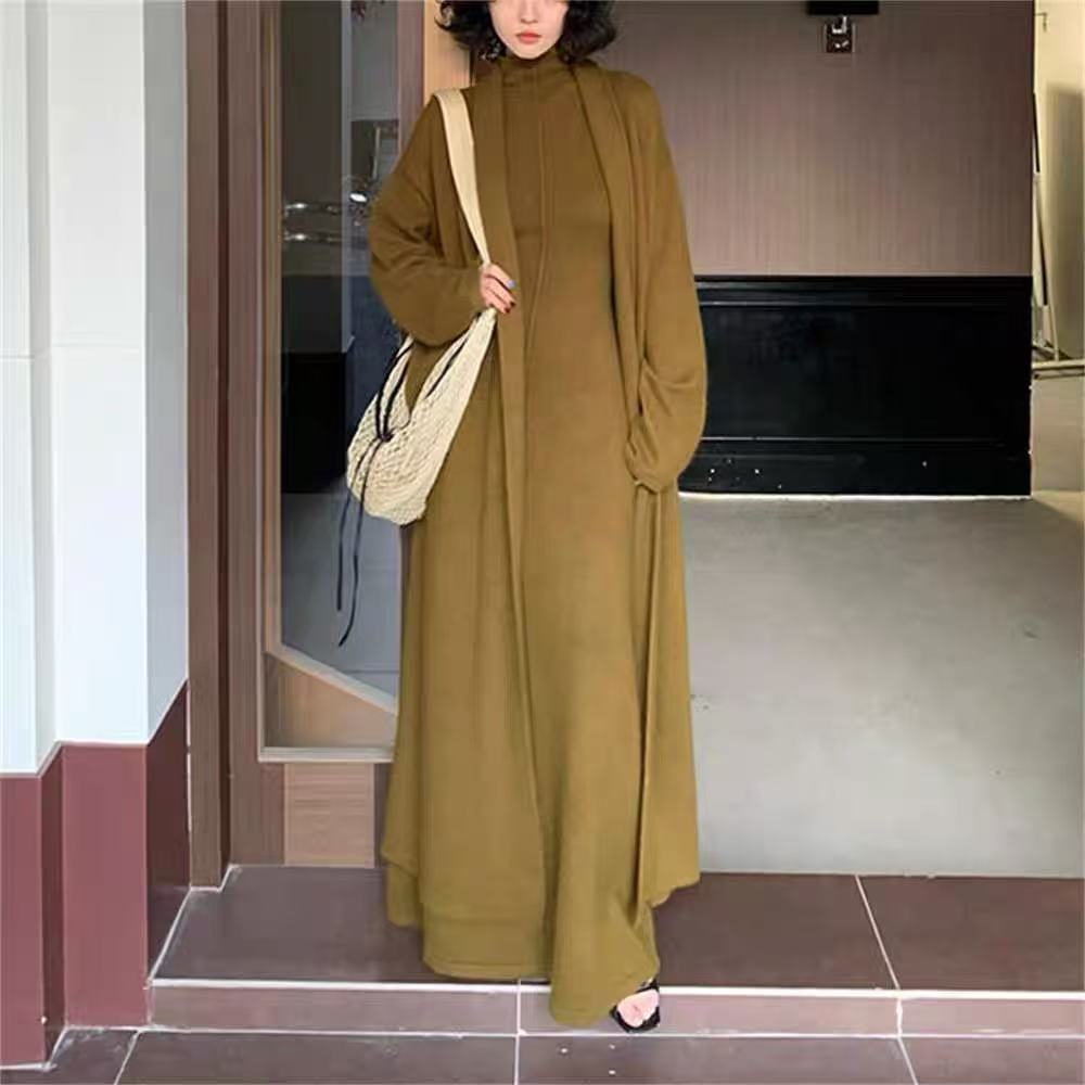 Damen Langer Strickmantel mit hohem Kragen und elegantem Schnitt EB