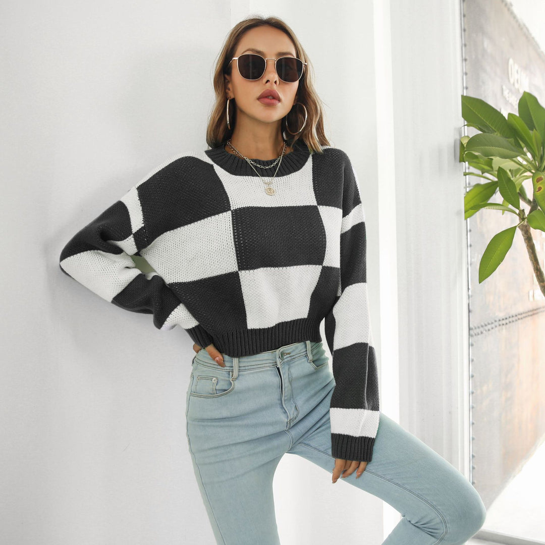Damen Oversized Strickpullover mit modernen Karomuster und hohem Kragen EB