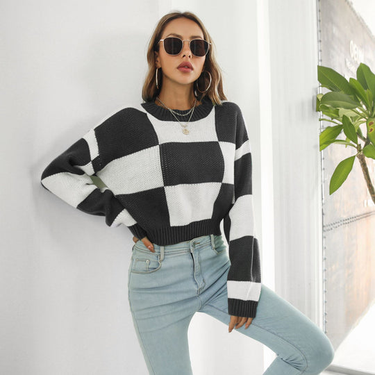 Damen Oversized Strickpullover mit modernen Karomuster und hohem Kragen EB