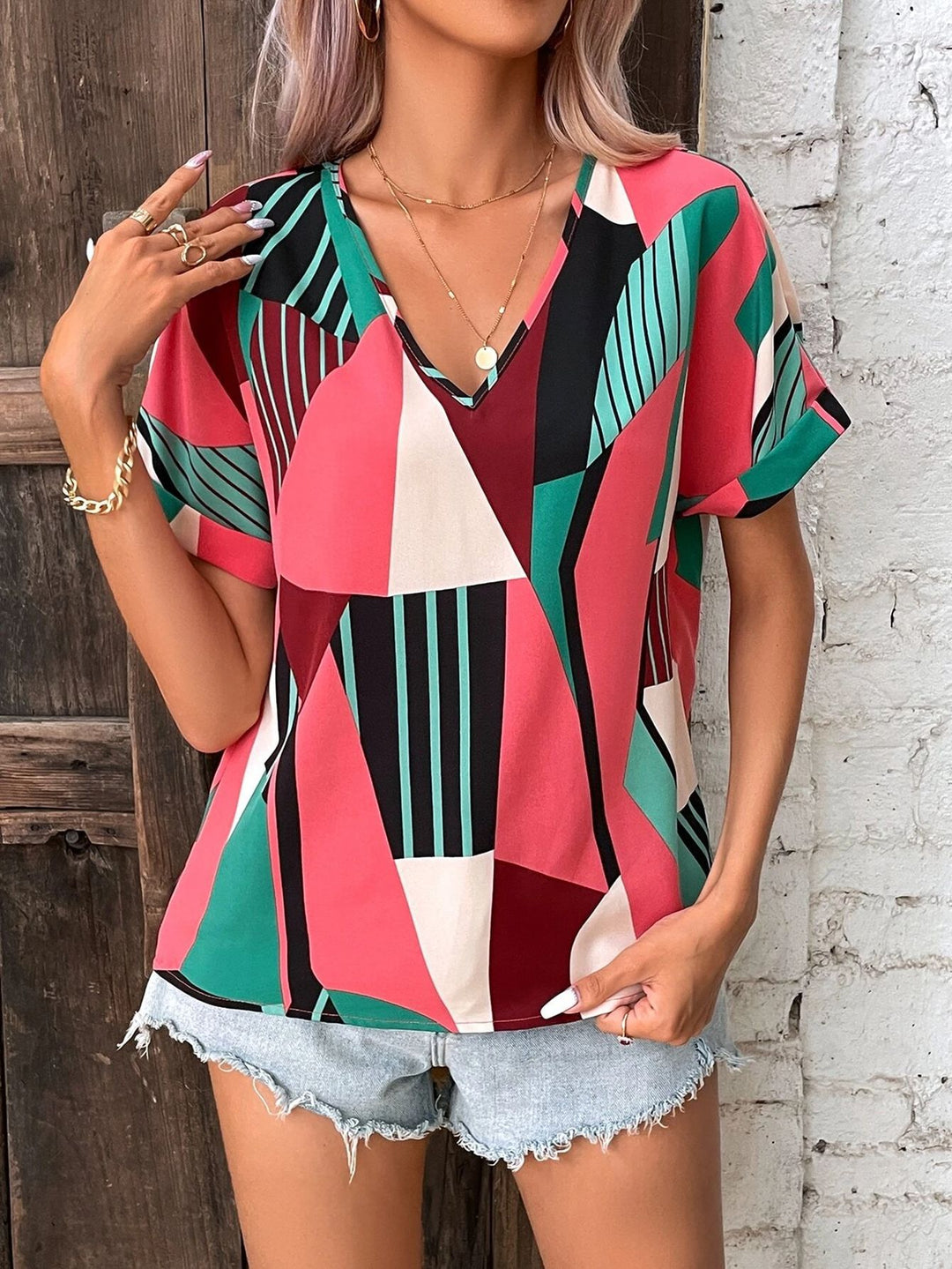 Damen V-Ausschnitt T-Shirt mit geometrischem Muster EB