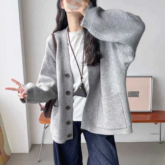 Damen Gemütliche Strickjacke mit großen Taschen und Knopfdetail EB