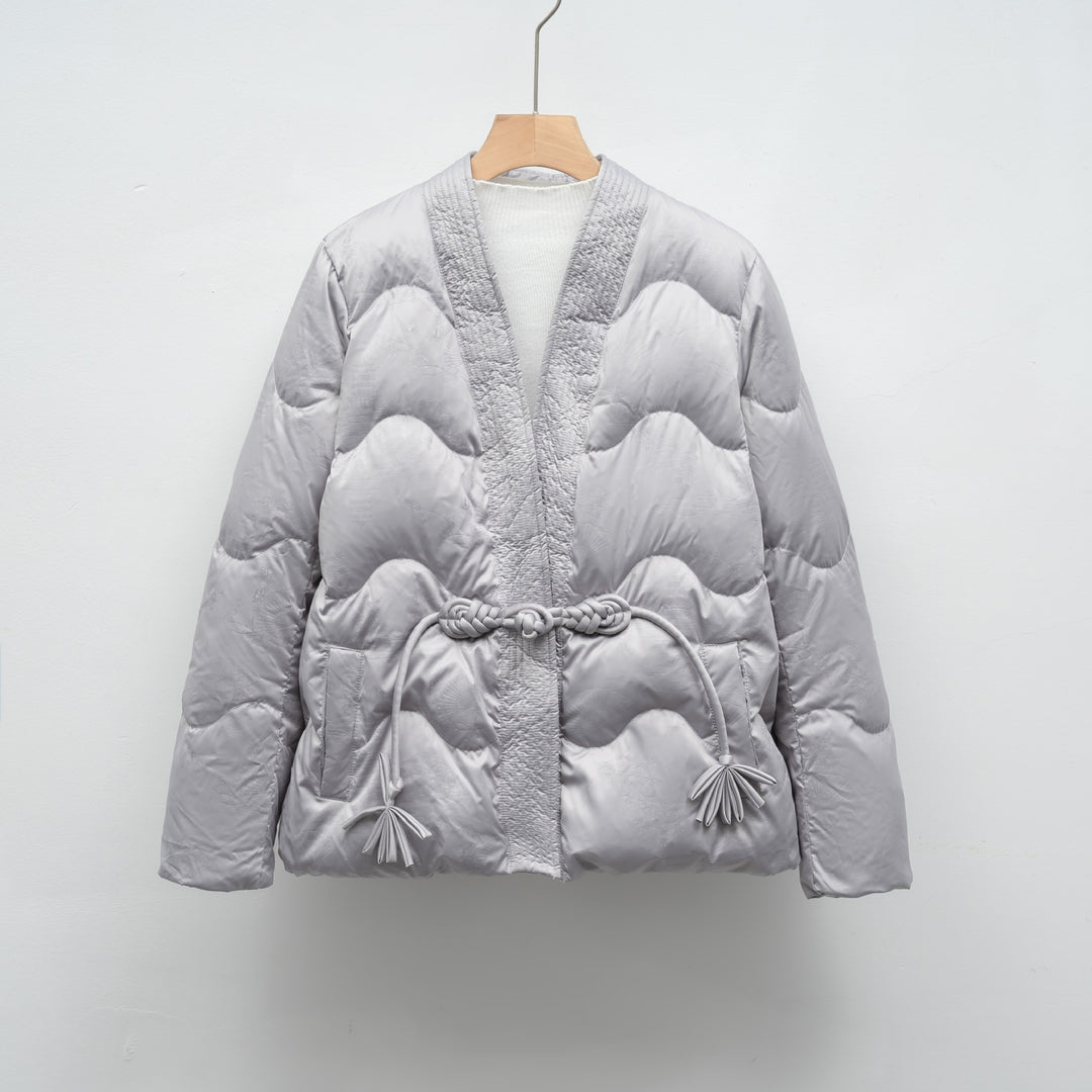 Damen Voluminöse Steppjacke mit Taillenzug und eleganter Struktur EB