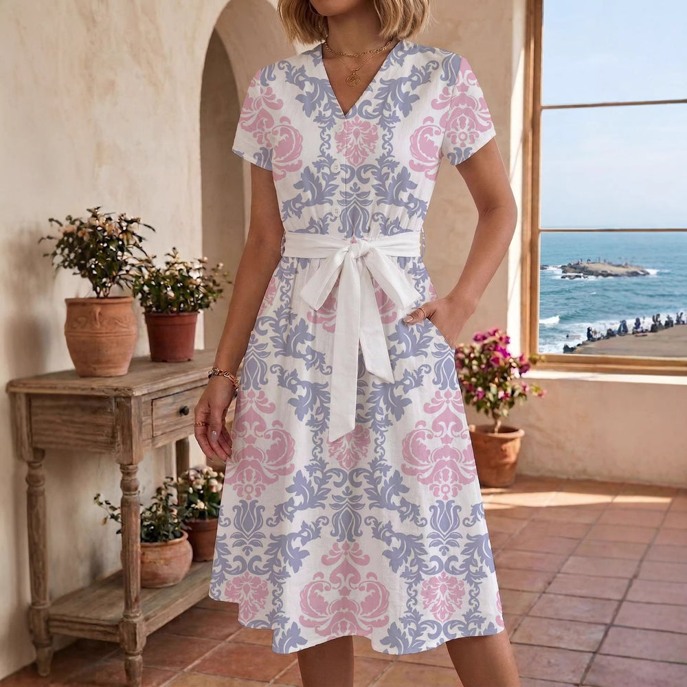 Damen Sommerliches Kleid mit taillierbarem Bindegürtel und floralem Muster EB