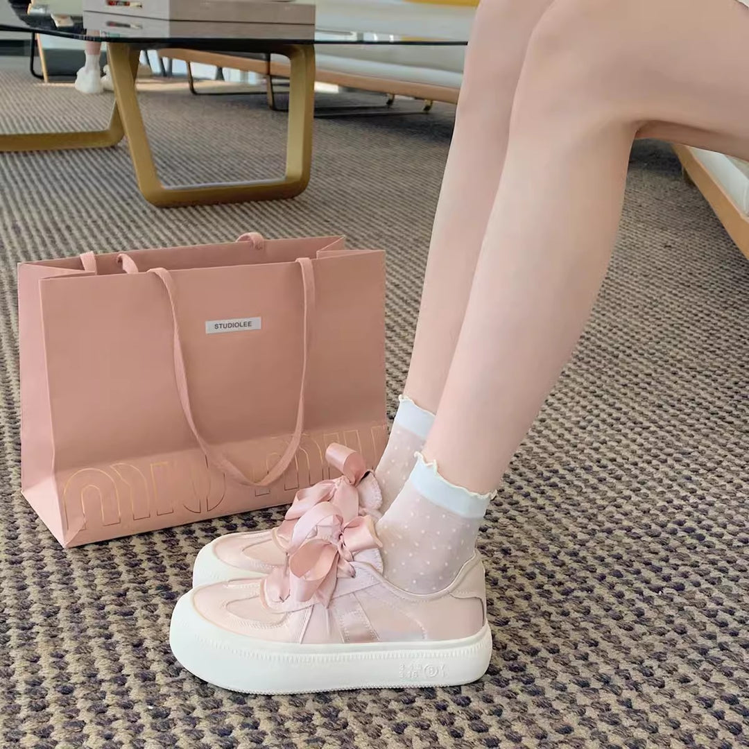 Damen Sneaker mit dekorativen Schleifen und hochwertiger Oberflächenstruktur EB