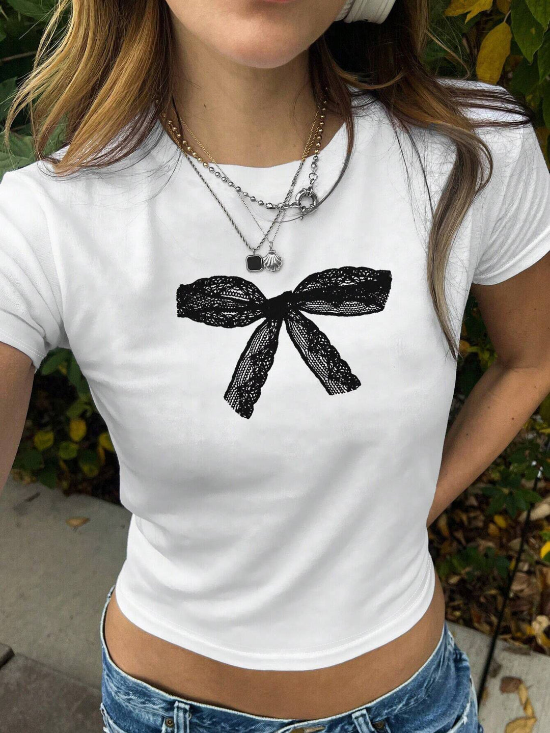 Damen T-Shirt mit verspieltem Katzenmotiv und zarten Flügeln EB