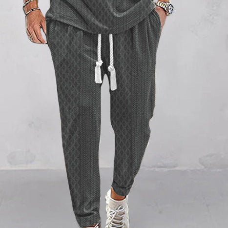 Herren Slim-Tapered Joggerhose im Struktur-Design mit Kordelzug und Eingrifftaschen EB