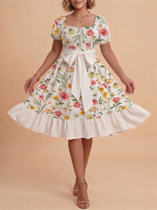 Damen Blumenkleid mit taillierbarem Gürtel und voluminösen Ärmeln EB
