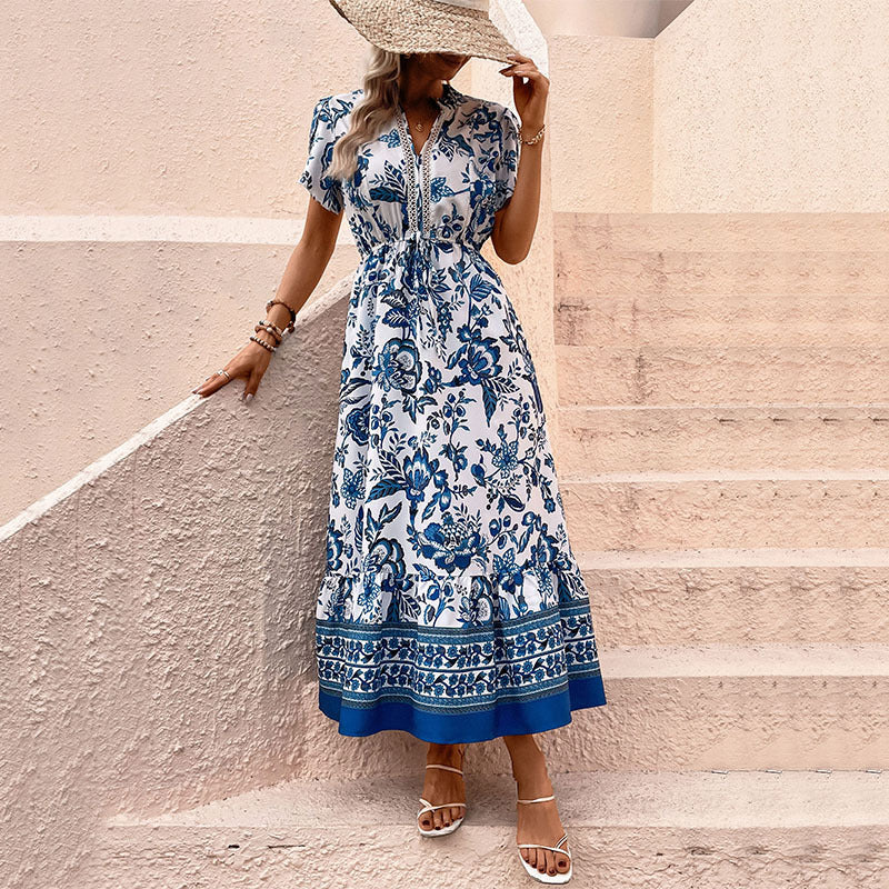 Damen Maxikleid mit floralen Mustern und tailliertem Design EB