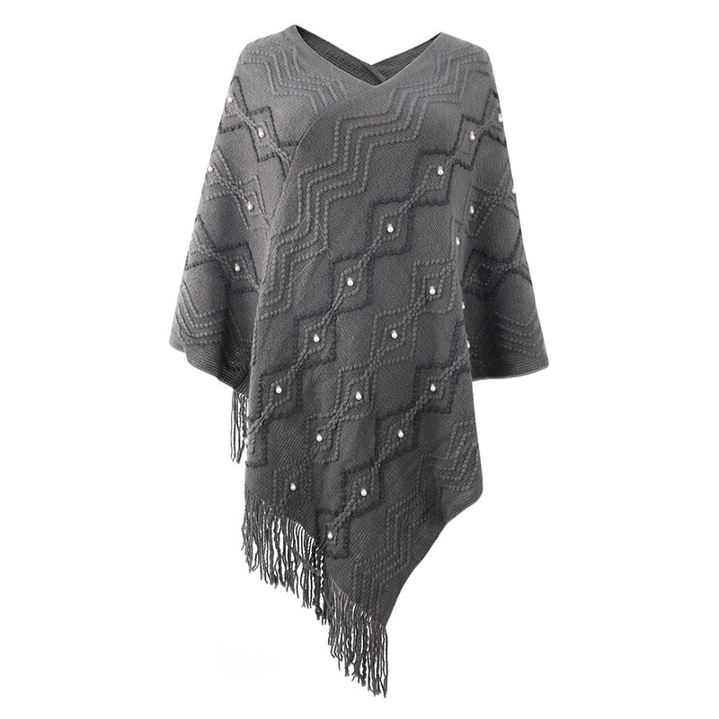 Damen eleganter Poncho mit auffälligem Strukturmuster und dekorativen Fransen EB