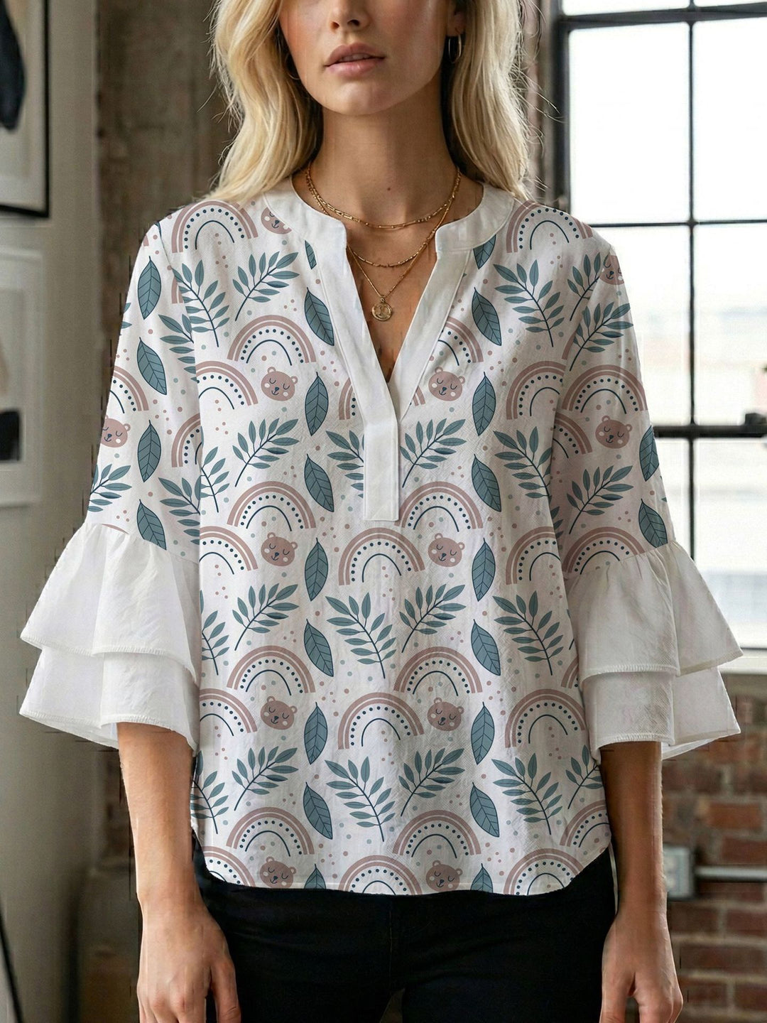Damen Bluse mit voluminösen Flügelärmel und intensivem Blattmuster EB