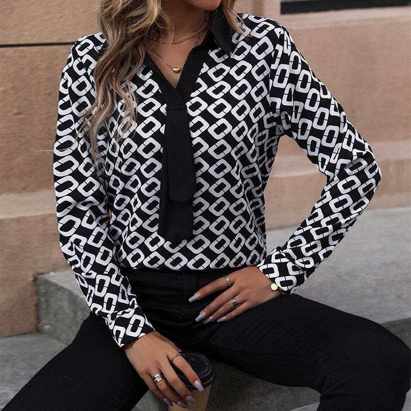 Damen Elegante Bluse mit modernem grafischem Muster und Krawattenverschluss EB