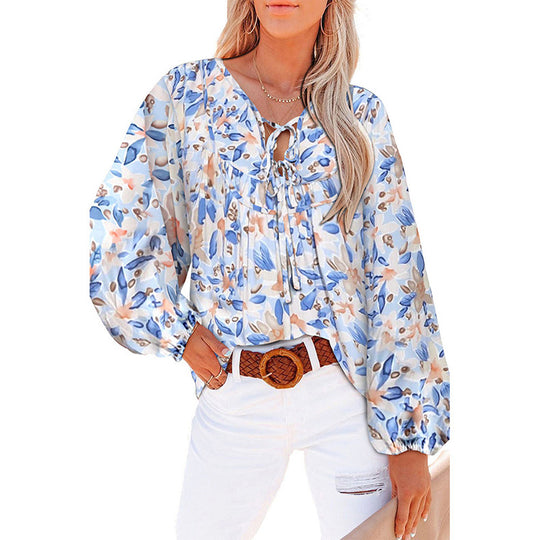 Damen Lockere Bluse mit floralem Muster und voluminösen Ärmeln EB