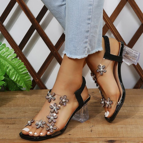 Damen Elegante Sandalen mit Blumenapplikationen und transparentem Absatz EB