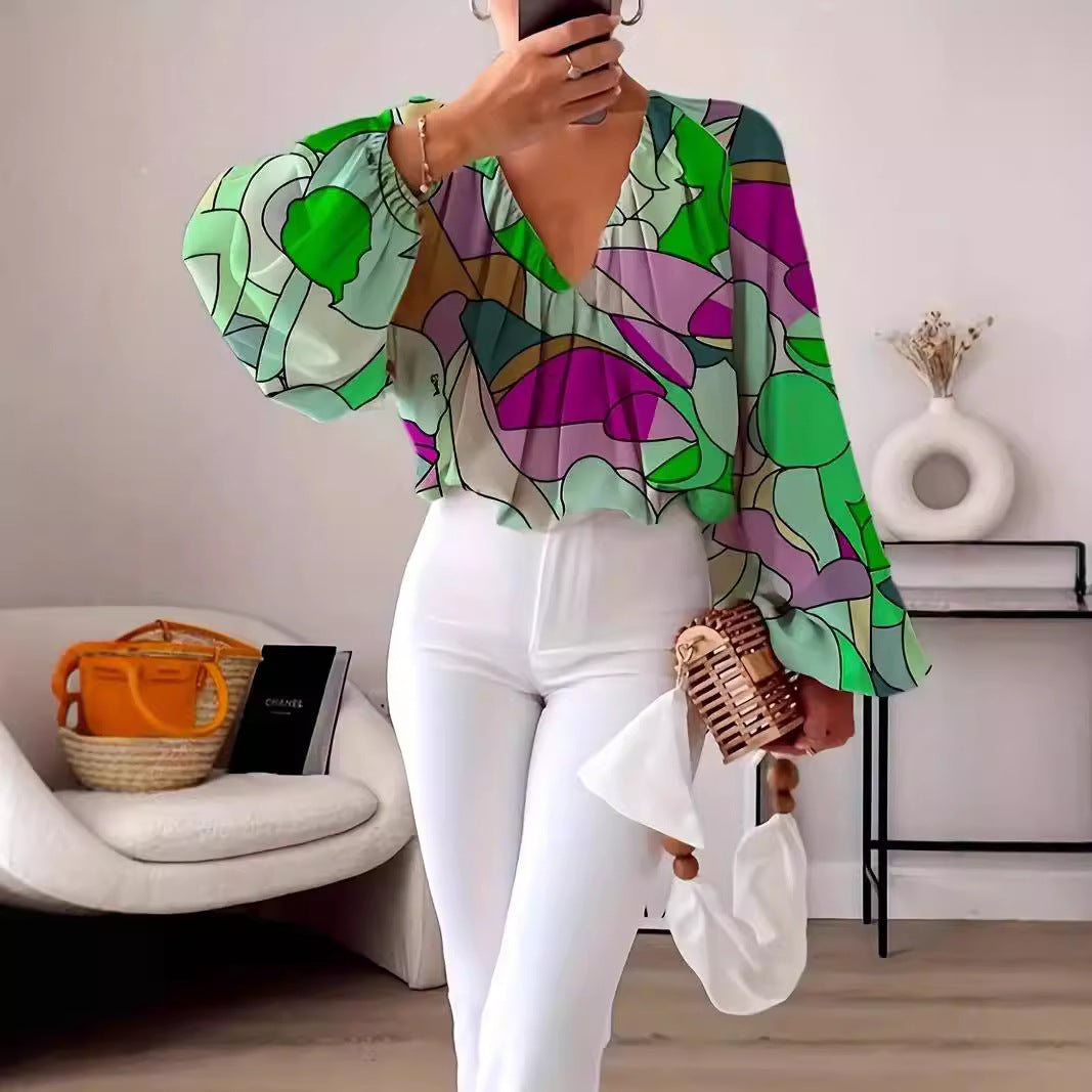 Damen Bluse mit V-Ausschnitt und modischem Grafikdesign EB