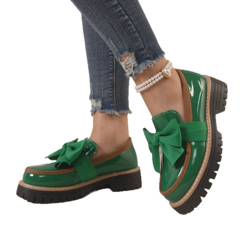 Damen  Lack-Loafer mit großer Zierschleife und profilierter Gummisohle EB