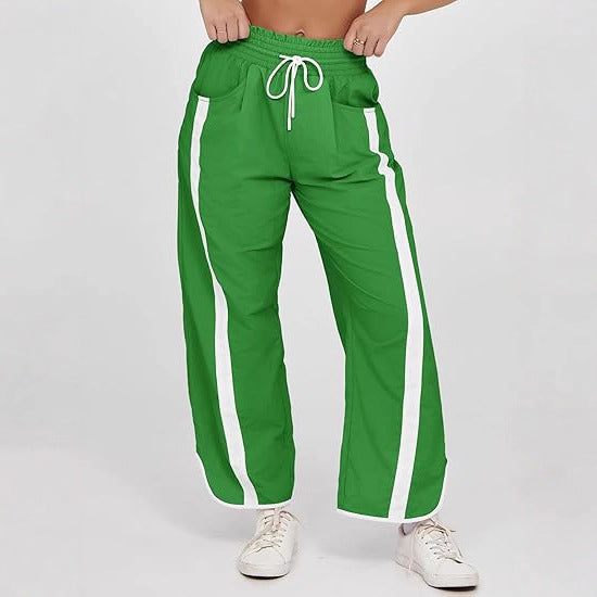 Damen nan relaxte Trackpants mit seitlichem Kontraststreifen, elastischem Smokbund und Eingrifftaschen EB