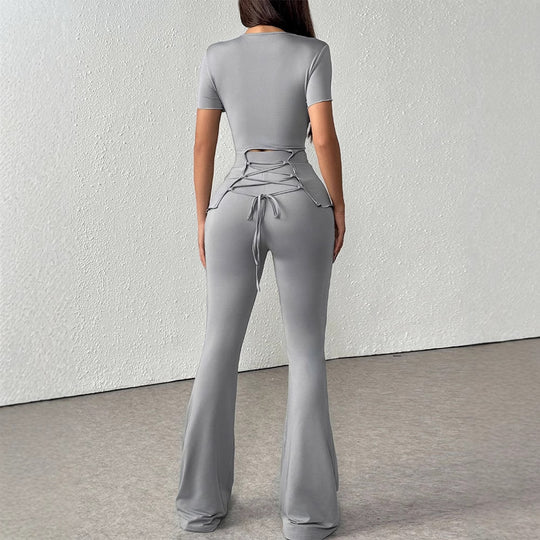 Damen elegantes Set aus figurbetontem Oberteil und ausgestellten Hosen EB