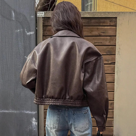 Damen Kunstlederjacke im sportlich-eleganten Schnitt mit elastischem Bund EB