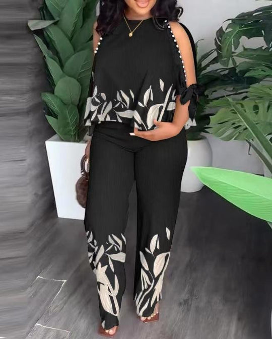 Damen Elegant gestaltetes Sommeroutfit mit floralem Design und Schulterfreiem Oberteil EB