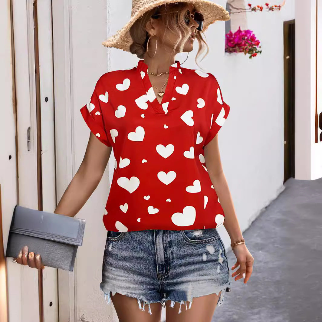 Damen luftiges Blusenshirt mit herzförmigem Print und lockerer Passform EB