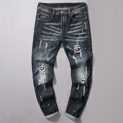 Herren Slim Fit Jeans mit kreativen Rissdesign und Farbklecksen EB