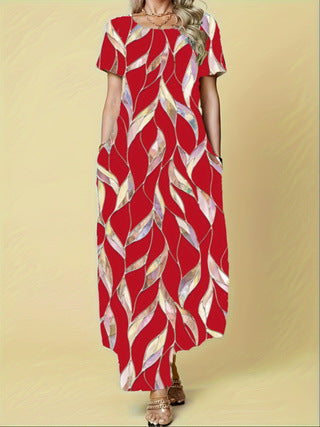 Damen Maxikleid mit lebhaftem Blattmuster und praktischen Taschen EB