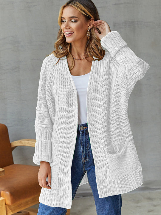 Damen gemütliche Strickjacke mit tiefen Taschen und volumetrischen Ärmeln EB