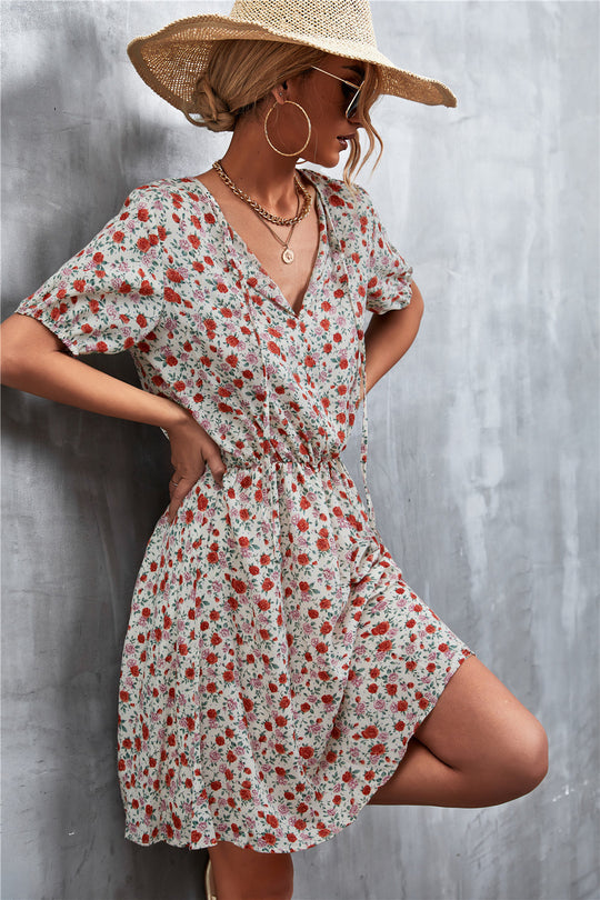 Damen Wickelkleid mit floralem Muster und elastischem Bund EB