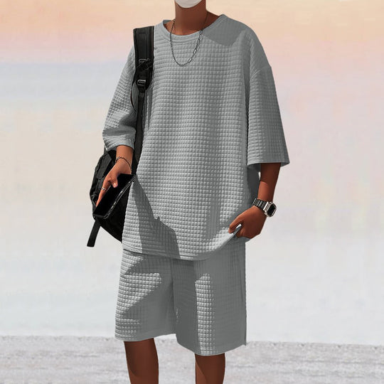 Herren nan quadratstruktur Freizeitset mit oversized Rundhalsshirt und knielangen Relax-Shorts EB