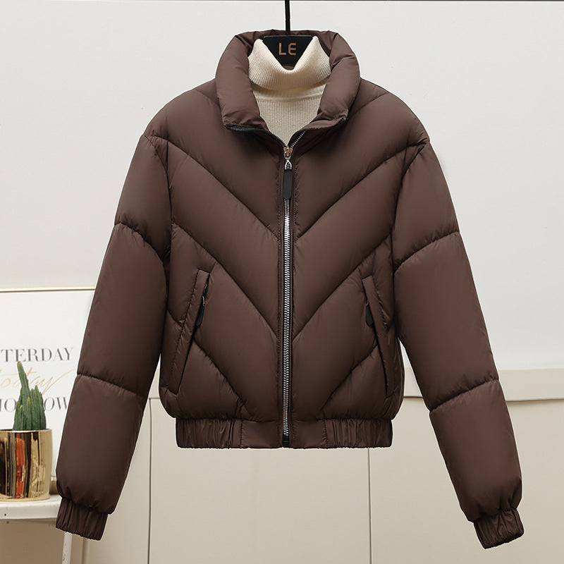 Damen Trendige und kuschelige Pufferjacke mit hohem Kragen und praktischen Eingrifftaschen EB