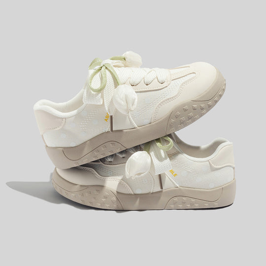 Damen Freizeit Sneakers mit leichtem Punktemuster und verspielten Schleifen EB