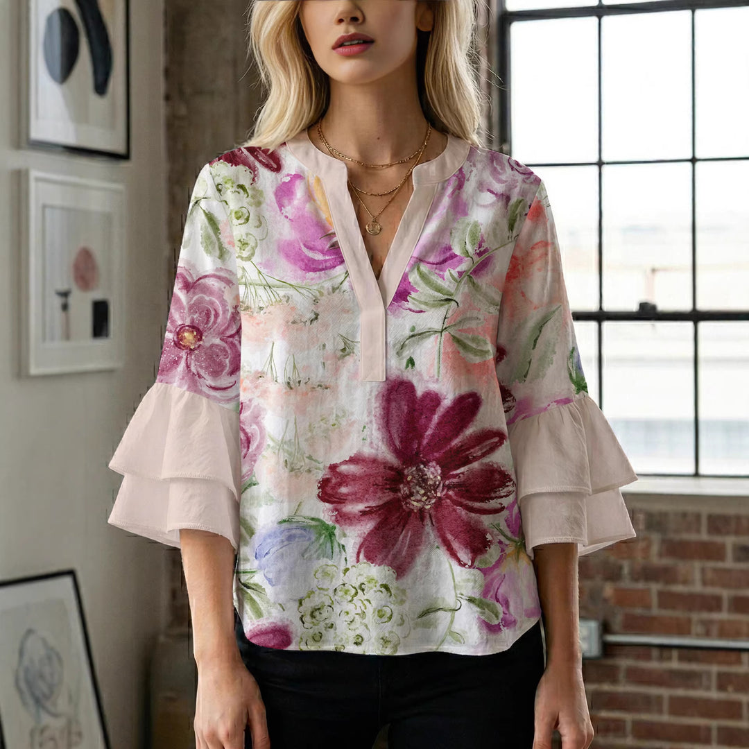 Damen Bluse mit voluminösen Ärmeln und floralem Design EB