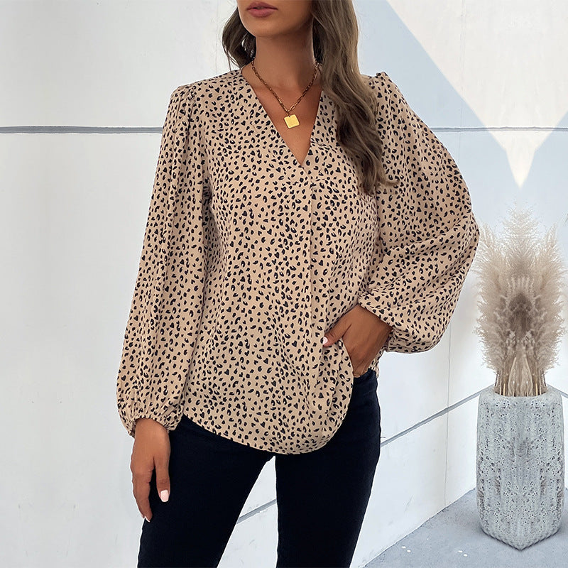 Damen Elegante Bluse mit Leoprint und voluminösen Ärmeln EB